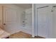 Bathroom with tub shower combination and linen closet at 4601 Glencrest Loop, Saint Cloud, FL 34772