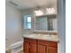 Bathroom with double vanity and a large mirror at 4601 Glencrest Loop, Saint Cloud, FL 34772