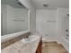 Bathroom with single vanity and tub shower at 4601 Glencrest Loop, Saint Cloud, FL 34772