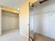 Large bedroom closet with mirrored doors and shelving at 4818 Marks Ter # 385 B2, Orlando, FL 32811