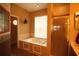 Relaxing bathroom featuring a whirlpool tub and shower at 560 Eden Dr, St Cloud, FL 34771