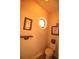 Convenient half bathroom with toilet and small sink at 560 Eden Dr, St Cloud, FL 34771