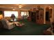 Spacious living room with ample seating and a built-in entertainment center at 560 Eden Dr, St Cloud, FL 34771