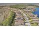 Aerial view of community with lake and conservation at 560 Presido Park Pl, Kissimmee, FL 34759