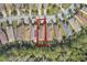 Aerial view showcasing a row of houses in a residential neighborhood at 560 Presido Park Pl, Kissimmee, FL 34759