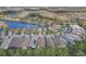 Aerial view of neighborhood near a lake at 560 Presido Park Pl, Kissimmee, FL 34759