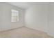 Bright bedroom with neutral carpeting at 560 Presido Park Pl, Kissimmee, FL 34759