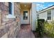 Stone walkway leading to the front entrance of the house at 560 Presido Park Pl, Kissimmee, FL 34759