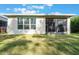 House exterior with a screened patio at 560 Presido Park Pl, Kissimmee, FL 34759