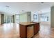 Kitchen island with granite countertop and stainless steel appliances at 560 Presido Park Pl, Kissimmee, FL 34759