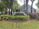 Central Park community entrance with landscaping and building view at 6106 Westgate Dr # 103, Orlando, FL 32835