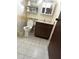 Bathroom with toilet, sink, and vanity at 6133 Olympic Ct, Orlando, FL 32808