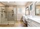 Bathroom boasts a large shower, double vanity, and modern finishes at 6228 Lecco Way, Windermere, FL 34786