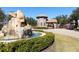 Gated community entrance with a fountain and landscaping at 6228 Lecco Way, Windermere, FL 34786