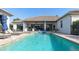 Resort-style pool and spa with spacious patio and outdoor seating at 6228 Lecco Way, Windermere, FL 34786