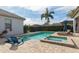 Inviting pool and spa with lounge chairs at 6228 Lecco Way, Windermere, FL 34786