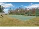 Outdoor basketball court with two hoops and ample space for play at 648 Cortona Dr, Orlando, FL 32828