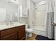 Bathroom with tub, shower, and wood vanity at 648 Cortona Dr, Orlando, FL 32828