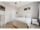 Bedroom with a full-size bed, dresser, and window with curtains at 648 Cortona Dr, Orlando, FL 32828
