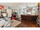 Game room with brown leather couch and a home office at 648 Cortona Dr, Orlando, FL 32828