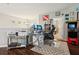 Home office with a workspace, printer, and arcade game at 648 Cortona Dr, Orlando, FL 32828