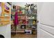 Well-organized pantry with adjustable shelving for storage at 648 Cortona Dr, Orlando, FL 32828