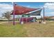 Playground with shaded play equipment and slides at 648 Cortona Dr, Orlando, FL 32828