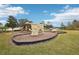 Community playground with climbing wall, slides and play structures at 648 Cortona Dr, Orlando, FL 32828
