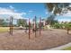 playground with climbing structures, slides, and play area at 648 Cortona Dr, Orlando, FL 32828