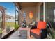 Screened patio with comfortable seating and beach decor at 648 Cortona Dr, Orlando, FL 32828
