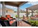 Relaxing screened porch with patio furniture and string lights at 648 Cortona Dr, Orlando, FL 32828
