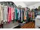 Large walk-in closet with ample shelving and hanging space at 648 Cortona Dr, Orlando, FL 32828