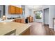 Kitchen with light wood cabinets, and ample counter space at 707 Terranova Ave, Winter Haven, FL 33884