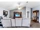 Living room with vaulted ceiling, gray walls, and comfy seating at 707 Terranova Ave, Winter Haven, FL 33884