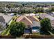 Aerial view of a house with a pool and screen enclosure at 8231 Lynch Dr, Orlando, FL 32835