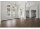 Bright dining room with hardwood floors and chandelier at 8231 Lynch Dr, Orlando, FL 32835