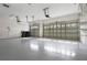 Spacious two-car garage with extra storage shelving at 8231 Lynch Dr, Orlando, FL 32835