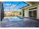 Inviting screened pool and spa with brick pavers at 8231 Lynch Dr, Orlando, FL 32835