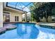 Resort-style pool and spa with screened enclosure at 8231 Lynch Dr, Orlando, FL 32835