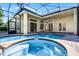 Luxury pool and spa with screened enclosure at 8231 Lynch Dr, Orlando, FL 32835