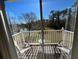 Relaxing balcony view overlooking a tranquil pond and lush greenery at 8513 Crystal Cove Loop, Kissimmee, FL 34747