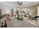 Bright living room with hardwood floors and high ceilings at 8575 Hempstead Way, Mount Dora, FL 32757