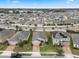 Aerial view of a house and neighborhood at 9653 Early Loop, Groveland, FL 34736