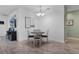 Charming dining area with round table and four chairs at 9653 Early Loop, Groveland, FL 34736