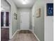 Clean and spacious entryway with a patterned rug at 9653 Early Loop, Groveland, FL 34736