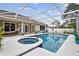 Relaxing pool and patio with covered seating and access to the home at 971 Worthington Ct, Oviedo, FL 32765