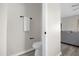 Clean, simple bathroom with toilet and towel rack at 100 Napoli Dr, Davenport, FL 33897