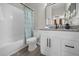 Clean bathroom with white vanity and shower/tub at 100 Napoli Dr, Davenport, FL 33897