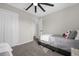 Simple bedroom with twin bed and ceiling fan at 100 Napoli Dr, Davenport, FL 33897