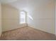 Bright bedroom with vaulted ceiling, carpet, and large window at 108 Strait Dr, Davenport, FL 33897